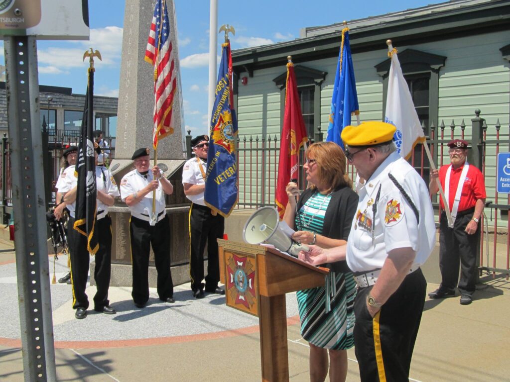 Kim speaking at Memorial Day Event