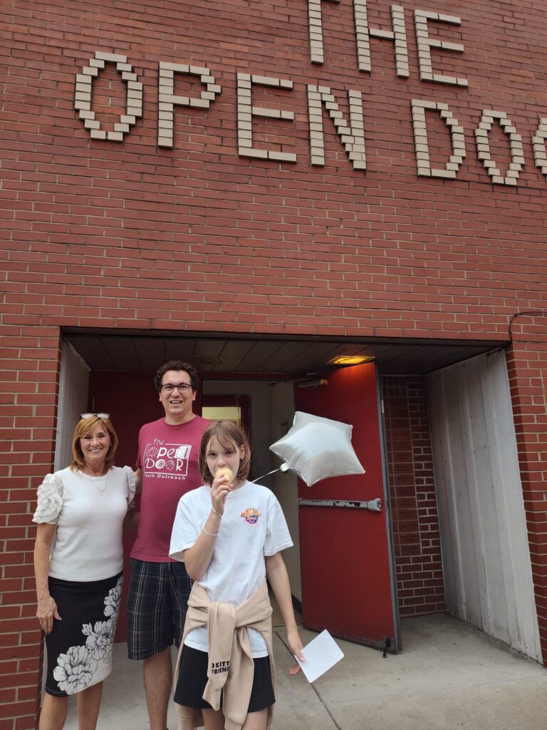 Kim Salinetro volunteering at the Open Door